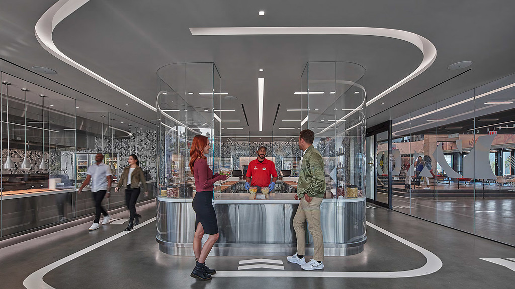 People standing in a large room.